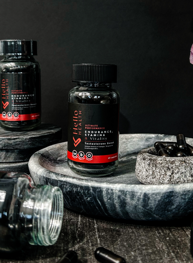 An image of capsule bottles of Hello Health Ultimate Performance Testosterone Booster for men for energy, vitality, lean muscle mass and libido